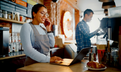 A businesswoman relies on her broadband connection to stay in touch with customers