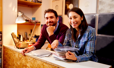 Happy businesspeople knowing they are covered by business insurance