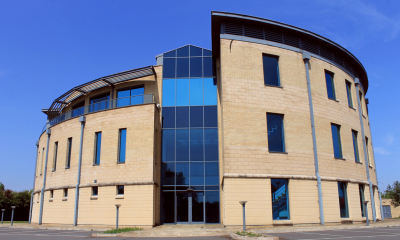 Brown building on a clear sunny day