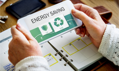 A woman reads the results of her potential energy savings