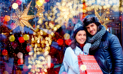 A happy couple buy Christmas gifts from local independent businesses