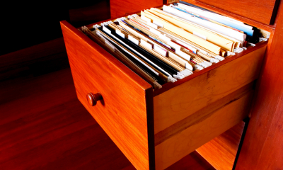Wooden drawer filled with corporation tax records