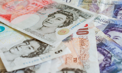 Multiple different types of British bank notes