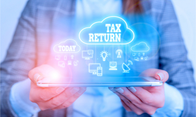 Text sign showing Tax Return. Conceptual photo of a tax payer with financial symbols.