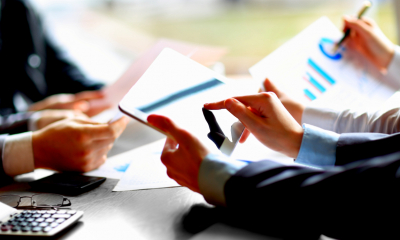 Floating your company Team reviewing company information