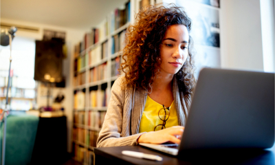 A young woman works on her start up business plan