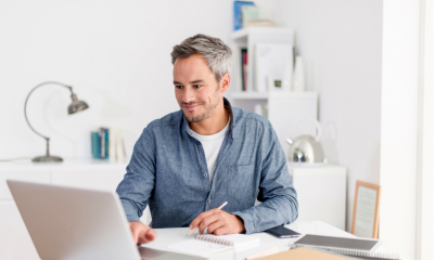 A man updates his accounts ready for the new tax year