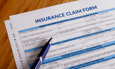 A pen on top of an insurance claim form