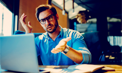 A frustrated man tries to work out his SEO strategy