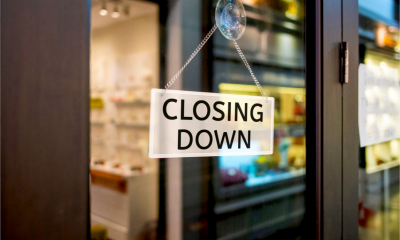 Closing down sign on the door of a high street payday lender