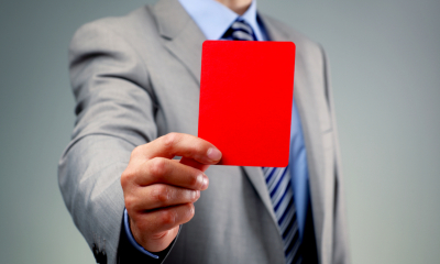 Man holding a red card