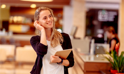 A female entrepreneur has a meeting at the bank to open an account