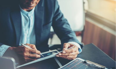 Businessman performing financial analysis