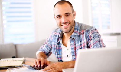 A man working on his side business