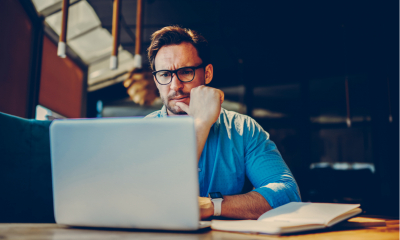Small business owner working at a laptop