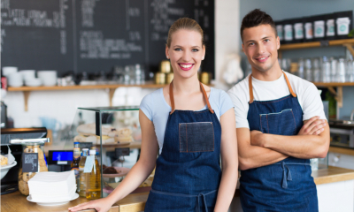 Small business owners in their cafe