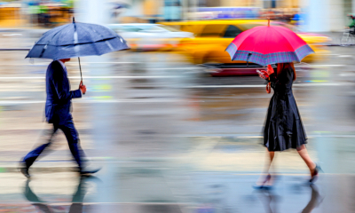 Business professionals in stormy weather